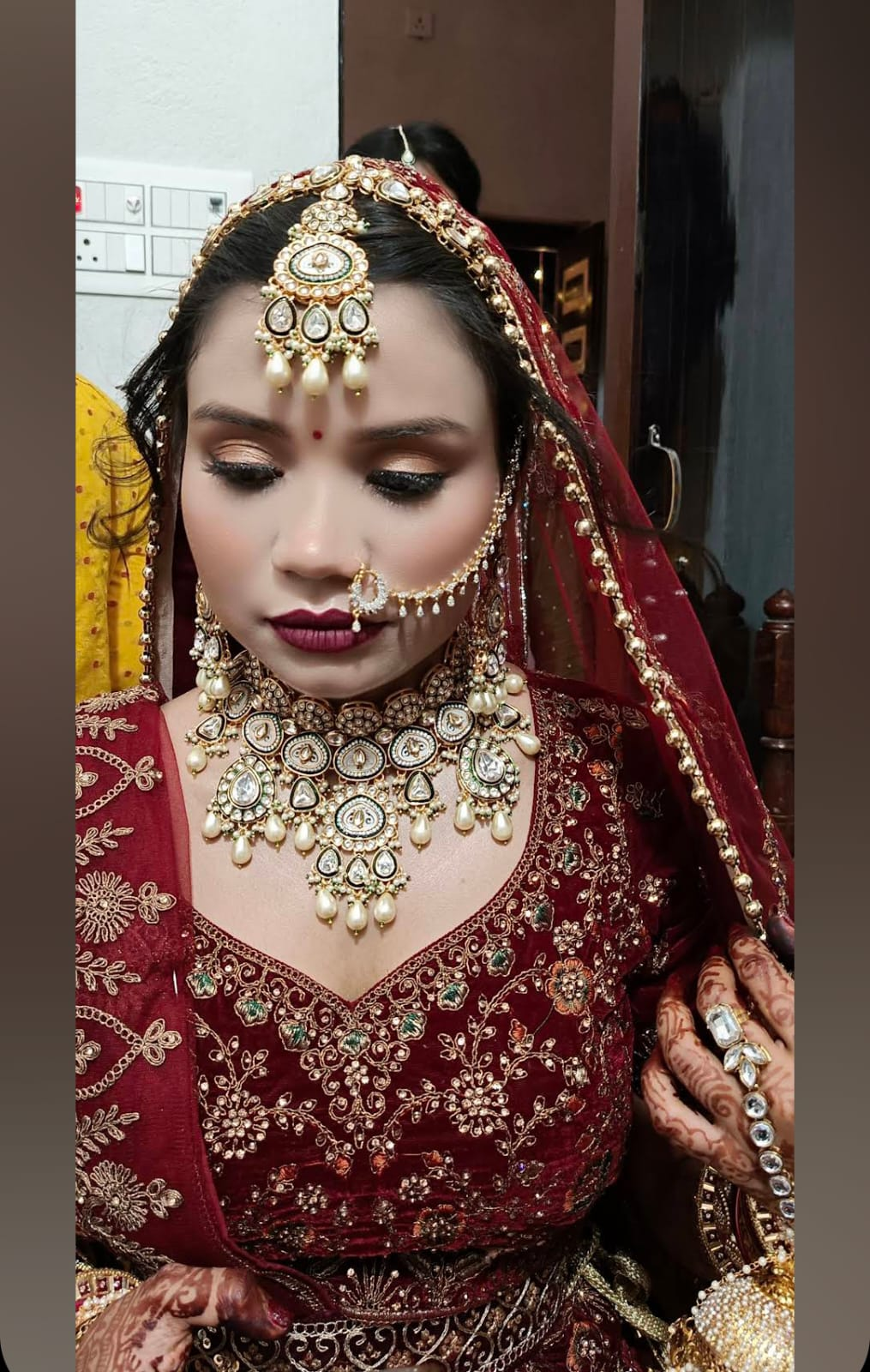 Close-up bridal makeup with kundan jewellery